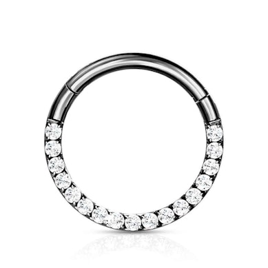 Hinged ring made of titanium with row of stones.
