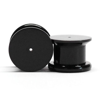 Plug made of acrylic for ear piercings.