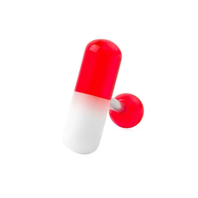 Tongue barbell with colored pill