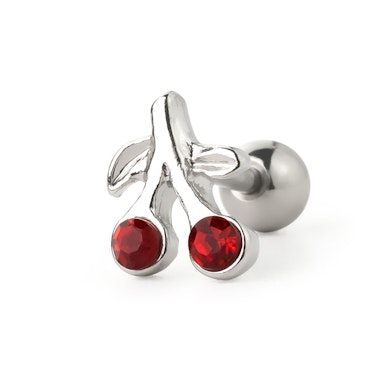 Ear piercing with red cherries