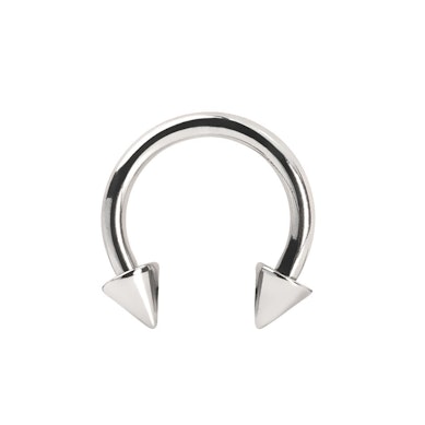 Circular barbell made of titanium with spikes