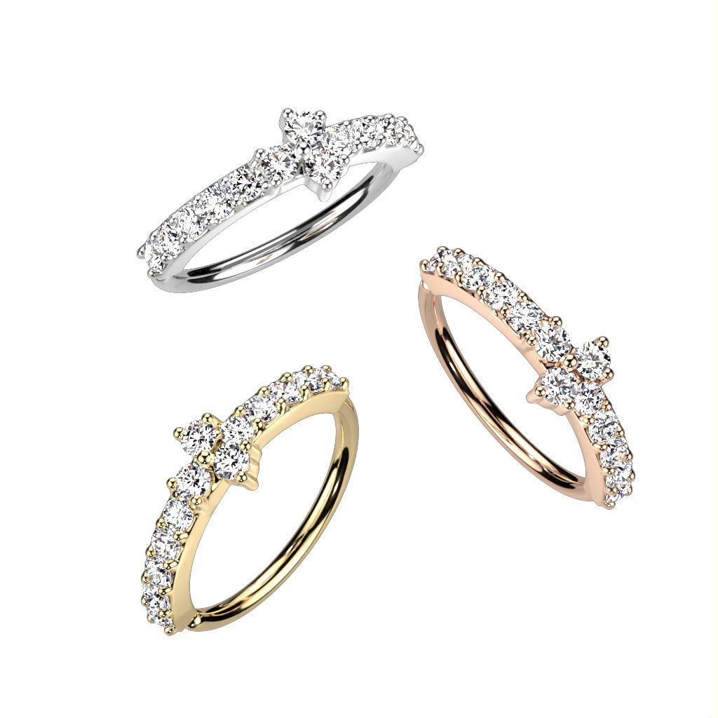 Twist ring with paving stones with a triangle center stone