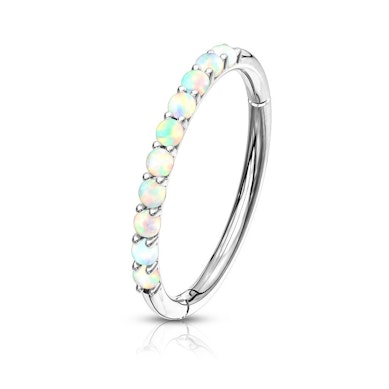 Clicker ring made of 14k gold with opalites