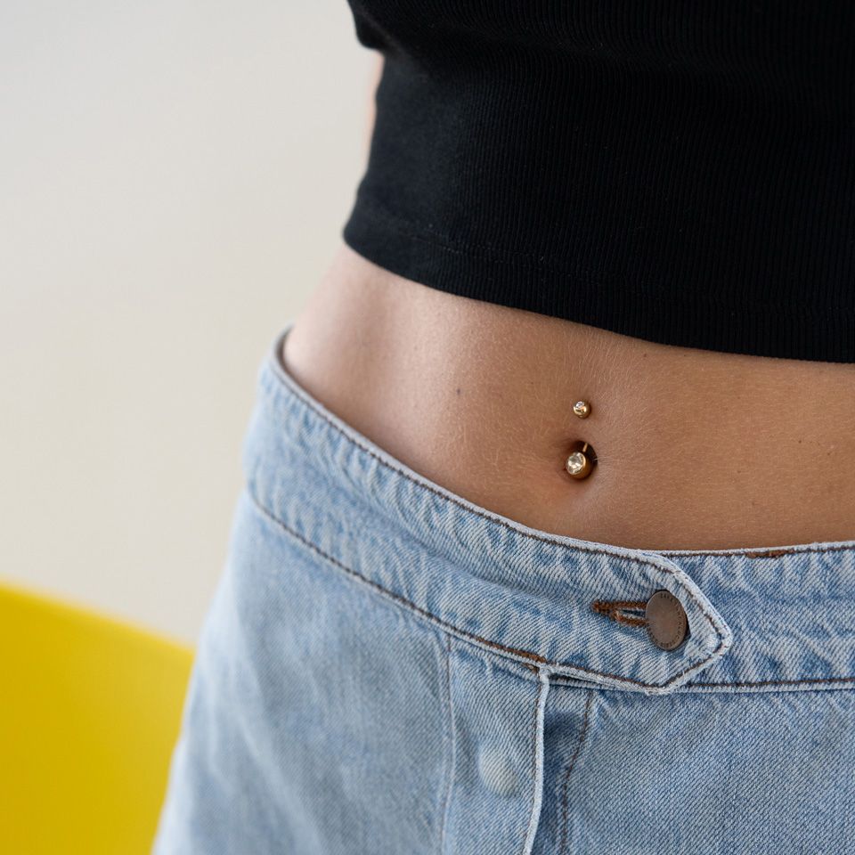 Bottom belly button piercings discount