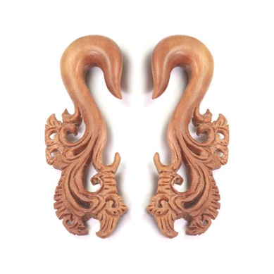 Hanger made of wood with ornamental design