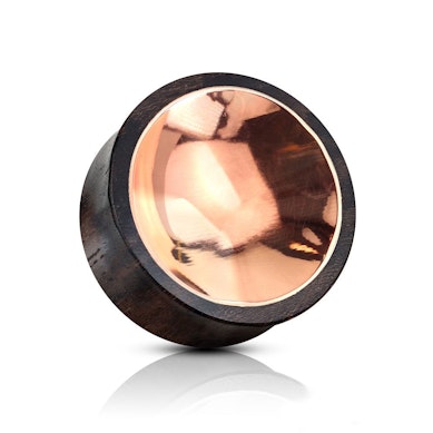 Flared wooden plug with copper front