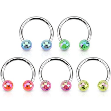 Circular barbell with splashes and play of colors