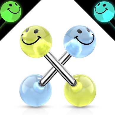 Tongue barbell with glow in the dark smiley face balls