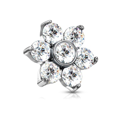 Dermal top jewelry with stones forming a flower