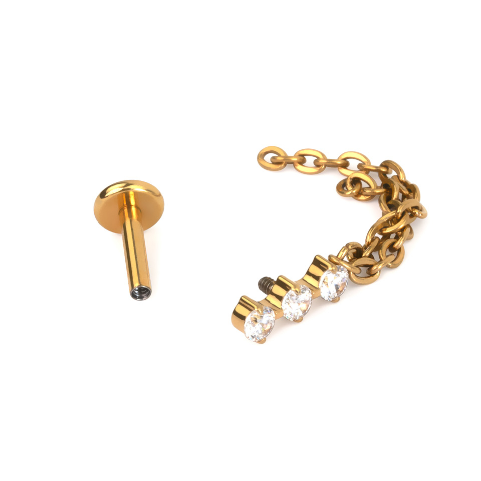 Titano labret auskaras su kristalų trio ir dviguba grandinėle