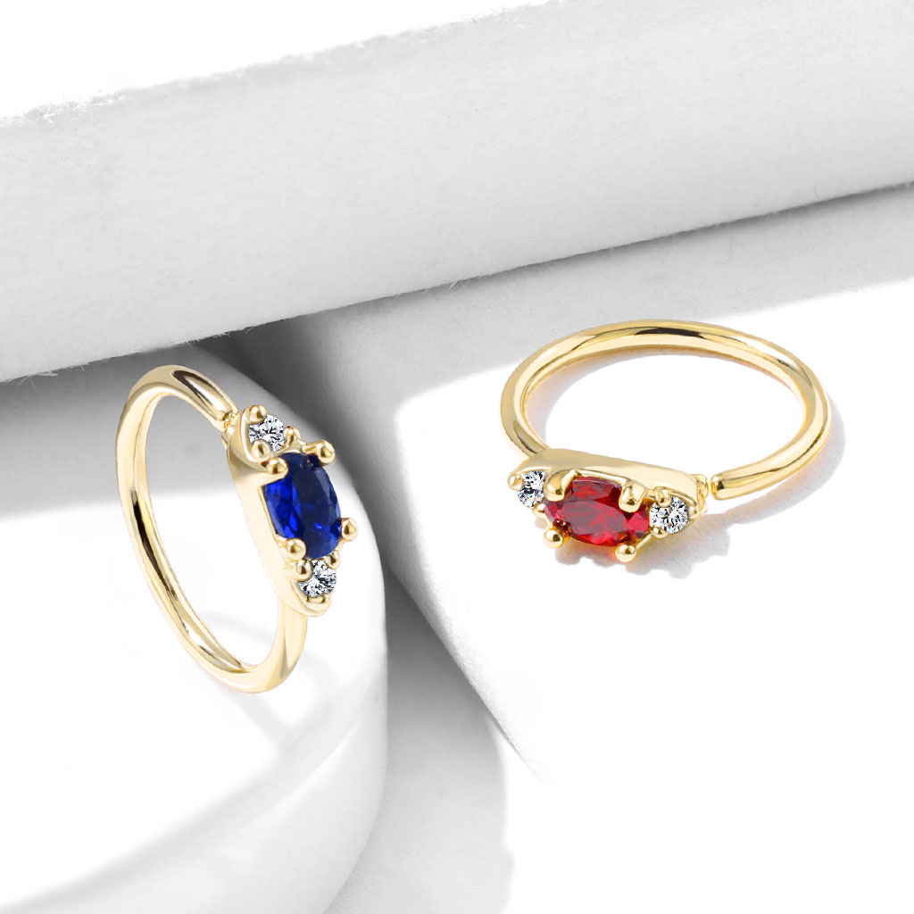 Žiedinis auskaras be užsegimo su ovaliu įvairių spalvų kristalu