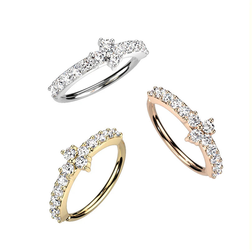 Twist ring with paving stones with a triangle center stone