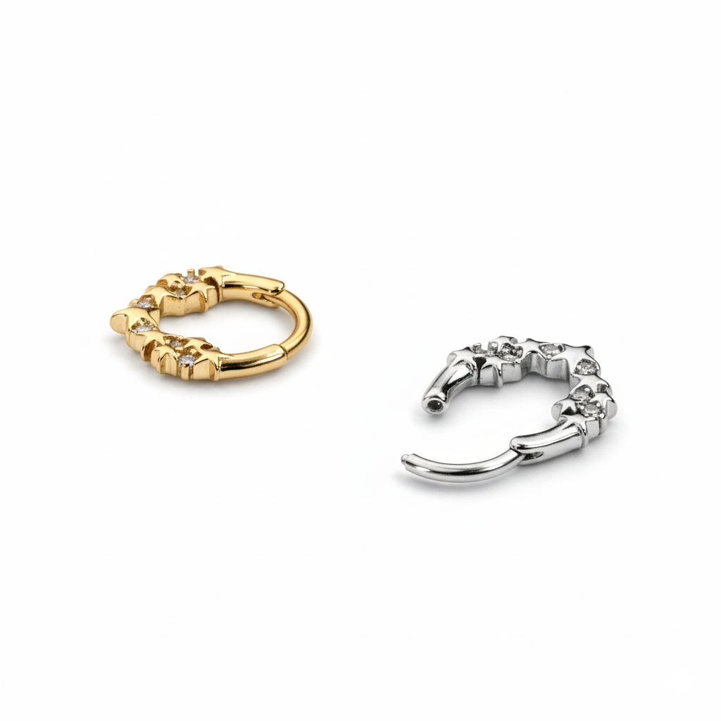 Žiedinis auskaras su priekyje esančiomis žvaigždutėmis ir akmenukais