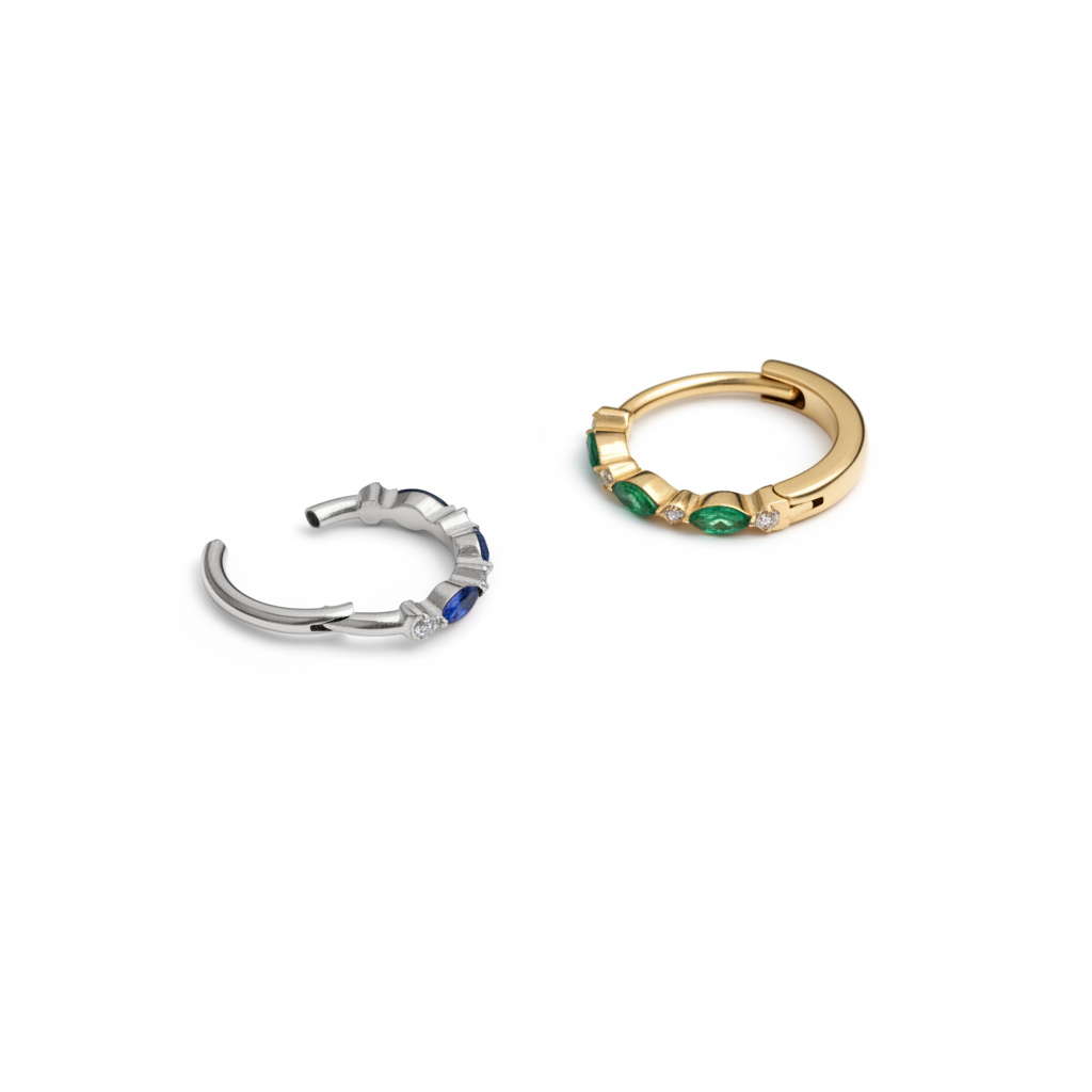 Titano žiedas su spalvotomis akutėmis